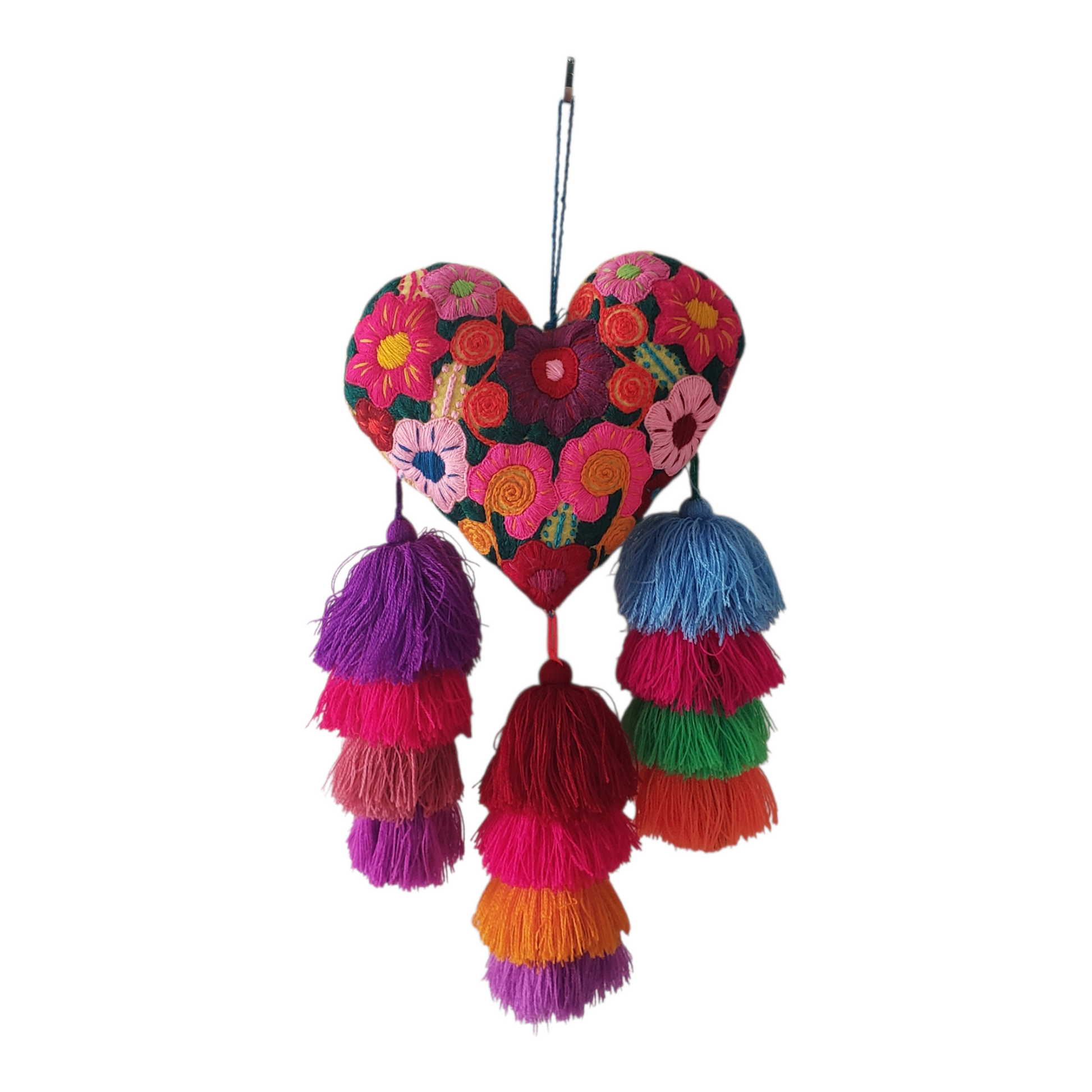 Colorful heart-shaped embroidered hanging decoration with tassels on a white background